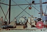 Image of Hoisting of Gadget atomic bomb before Trinity nuclear test Alamogordo New Mexico USA, 1945, second 13 stock footage video 65675072463