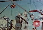 Image of Hoisting of Gadget atomic bomb before Trinity nuclear test Alamogordo New Mexico USA, 1945, second 14 stock footage video 65675072463