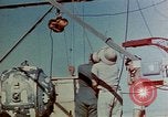 Image of Hoisting of Gadget atomic bomb before Trinity nuclear test Alamogordo New Mexico USA, 1945, second 15 stock footage video 65675072463