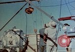 Image of Hoisting of Gadget atomic bomb before Trinity nuclear test Alamogordo New Mexico USA, 1945, second 16 stock footage video 65675072463