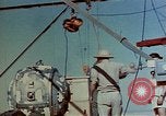 Image of Hoisting of Gadget atomic bomb before Trinity nuclear test Alamogordo New Mexico USA, 1945, second 17 stock footage video 65675072463