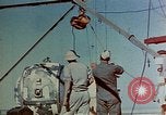Image of Hoisting of Gadget atomic bomb before Trinity nuclear test Alamogordo New Mexico USA, 1945, second 18 stock footage video 65675072463