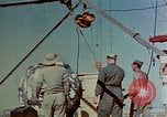 Image of Hoisting of Gadget atomic bomb before Trinity nuclear test Alamogordo New Mexico USA, 1945, second 19 stock footage video 65675072463