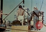 Image of Hoisting of Gadget atomic bomb before Trinity nuclear test Alamogordo New Mexico USA, 1945, second 23 stock footage video 65675072463