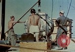 Image of Hoisting of Gadget atomic bomb before Trinity nuclear test Alamogordo New Mexico USA, 1945, second 24 stock footage video 65675072463
