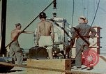 Image of Hoisting of Gadget atomic bomb before Trinity nuclear test Alamogordo New Mexico USA, 1945, second 25 stock footage video 65675072463