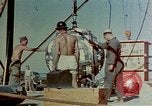 Image of Hoisting of Gadget atomic bomb before Trinity nuclear test Alamogordo New Mexico USA, 1945, second 26 stock footage video 65675072463