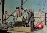 Image of Hoisting of Gadget atomic bomb before Trinity nuclear test Alamogordo New Mexico USA, 1945, second 27 stock footage video 65675072463