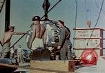 Image of Hoisting of Gadget atomic bomb before Trinity nuclear test Alamogordo New Mexico USA, 1945, second 29 stock footage video 65675072463