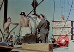 Image of Hoisting of Gadget atomic bomb before Trinity nuclear test Alamogordo New Mexico USA, 1945, second 31 stock footage video 65675072463