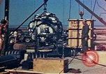 Image of Hoisting of Gadget atomic bomb before Trinity nuclear test Alamogordo New Mexico USA, 1945, second 38 stock footage video 65675072463