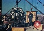 Image of Hoisting of Gadget atomic bomb before Trinity nuclear test Alamogordo New Mexico USA, 1945, second 40 stock footage video 65675072463