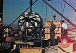 Image of Hoisting of Gadget atomic bomb before Trinity nuclear test Alamogordo New Mexico USA, 1945, second 42 stock footage video 65675072463
