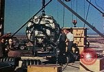 Image of Hoisting of Gadget atomic bomb before Trinity nuclear test Alamogordo New Mexico USA, 1945, second 43 stock footage video 65675072463