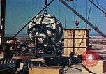 Image of Hoisting of Gadget atomic bomb before Trinity nuclear test Alamogordo New Mexico USA, 1945, second 44 stock footage video 65675072463