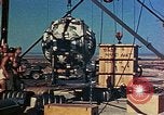 Image of Hoisting of Gadget atomic bomb before Trinity nuclear test Alamogordo New Mexico USA, 1945, second 46 stock footage video 65675072463