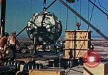 Image of Hoisting of Gadget atomic bomb before Trinity nuclear test Alamogordo New Mexico USA, 1945, second 47 stock footage video 65675072463