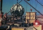 Image of Hoisting of Gadget atomic bomb before Trinity nuclear test Alamogordo New Mexico USA, 1945, second 48 stock footage video 65675072463