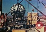 Image of Hoisting of Gadget atomic bomb before Trinity nuclear test Alamogordo New Mexico USA, 1945, second 49 stock footage video 65675072463