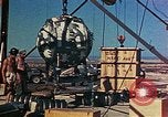 Image of Hoisting of Gadget atomic bomb before Trinity nuclear test Alamogordo New Mexico USA, 1945, second 50 stock footage video 65675072463