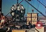 Image of Hoisting of Gadget atomic bomb before Trinity nuclear test Alamogordo New Mexico USA, 1945, second 52 stock footage video 65675072463