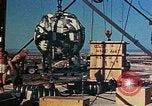 Image of Hoisting of Gadget atomic bomb before Trinity nuclear test Alamogordo New Mexico USA, 1945, second 53 stock footage video 65675072463