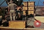 Image of Hoisting of Gadget atomic bomb before Trinity nuclear test Alamogordo New Mexico USA, 1945, second 57 stock footage video 65675072463