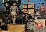 Image of Hoisting of Gadget atomic bomb before Trinity nuclear test Alamogordo New Mexico USA, 1945, second 61 stock footage video 65675072463