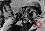 Standbild American gun crew Feuern 105mm Howitzer Deutschland, 1945, aus Sekunde 21 historischem Filmmaterial Videoclip 65675072467