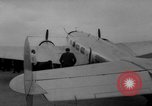 Image of Ann Pellegreno re-enacting Amelia Earhart's flight San Francisco California USA, 1967, second 23 stock footage video 65675072492