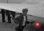Image of Ann Pellegreno re-enacting Amelia Earhart's flight San Francisco California USA, 1967, second 25 stock footage video 65675072492