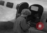 Image of Ann Pellegreno re-enacting Amelia Earhart's flight San Francisco California USA, 1967, second 27 stock footage video 65675072492