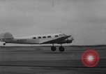 Image of Ann Pellegreno re-enacting Amelia Earhart's flight San Francisco California USA, 1967, second 33 stock footage video 65675072492