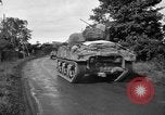 Standbild US4th Armored Division in Operation Cobra in Zweiten Weltkrieg Periers Frankreich, 1944, aus Sekunde 62 historischem Filmmaterial Videoclip 65675072546