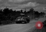 Standbild USA 2nd Armored Division während der Operation Cobra in Zweiten Weltkrieg Canisy Frankreich, 1944, aus Sekunde 1 historischem Filmmaterial Videoclip 65675072548