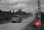 Standbild USA 2nd Armored Division während der Operation Cobra in Zweiten Weltkrieg Canisy Frankreich, 1944, aus Sekunde 35 historischem Filmmaterial Videoclip 65675072548