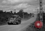 Standbild USA 2nd Armored Division während der Operation Cobra in Zweiten Weltkrieg Canisy Frankreich, 1944, aus Sekunde 36 historischem Filmmaterial Videoclip 65675072548