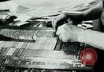 Image of German propaganda newspaper printing World War 2 Paris France, 1940, second 19 stock footage video 65675072693