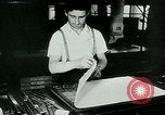 Image of German propaganda newspaper printing World War 2 Paris France, 1940, second 34 stock footage video 65675072693