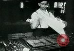 Image of German propaganda newspaper printing World War 2 Paris France, 1940, second 38 stock footage video 65675072693