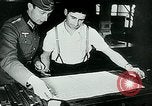 Image of German propaganda newspaper printing World War 2 Paris France, 1940, second 40 stock footage video 65675072693