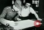Image of German propaganda newspaper printing World War 2 Paris France, 1940, second 41 stock footage video 65675072693