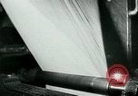 Image of German propaganda newspaper printing World War 2 Paris France, 1940, second 42 stock footage video 65675072693