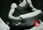 Image of German propaganda newspaper printing World War 2 Paris France, 1940, second 54 stock footage video 65675072693