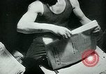 Image of German propaganda newspaper printing World War 2 Paris France, 1940, second 55 stock footage video 65675072693
