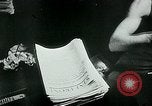 Image of German propaganda newspaper printing World War 2 Paris France, 1940, second 59 stock footage video 65675072693