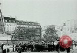 Image of French civilians listen to German propaganda broadcast Paris France, 1940, second 7 stock footage video 65675072694
