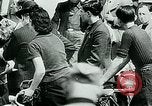 Image of French civilians listen to German propaganda broadcast Paris France, 1940, second 13 stock footage video 65675072694