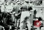Image of French civilians listen to German propaganda broadcast Paris France, 1940, second 15 stock footage video 65675072694