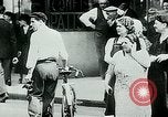 Image of French civilians listen to German propaganda broadcast Paris France, 1940, second 17 stock footage video 65675072694